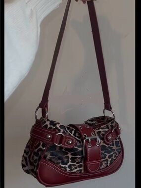 Leopard Print Shoulder Bag with Burgundy Trim and Buckle Detail